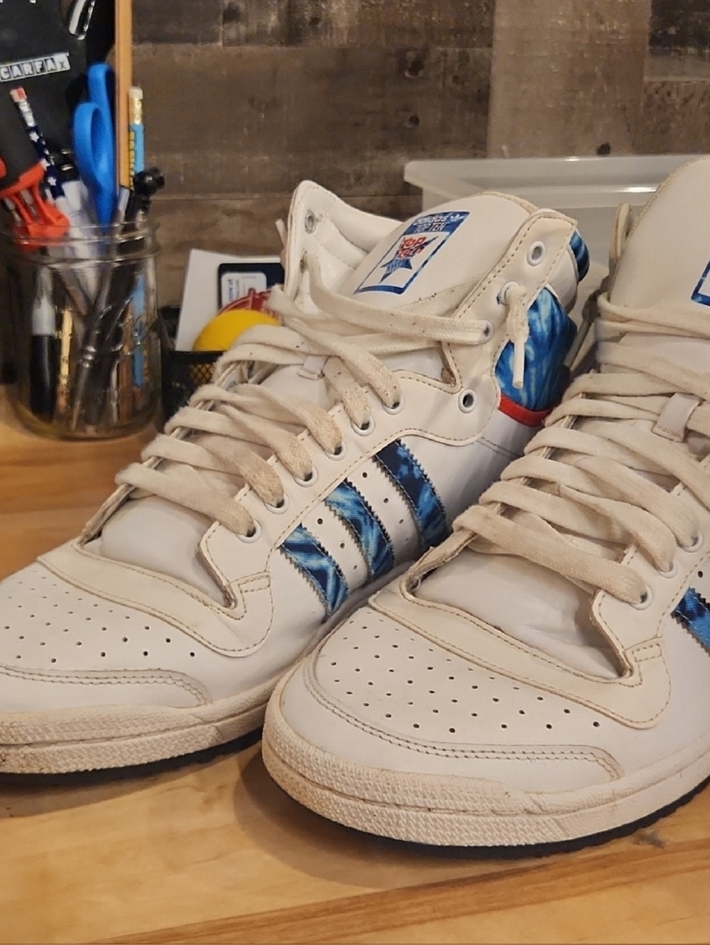 adidas White and Blue High-Top Sneakers - Top Ten